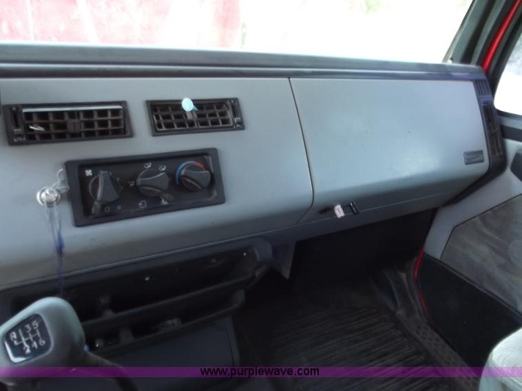 image for item C2014 1998 Freightliner FL60 business class roll back extended cab truck