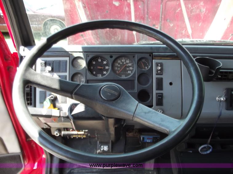 image for item C2014 1998 Freightliner FL60 business class roll back extended cab truck