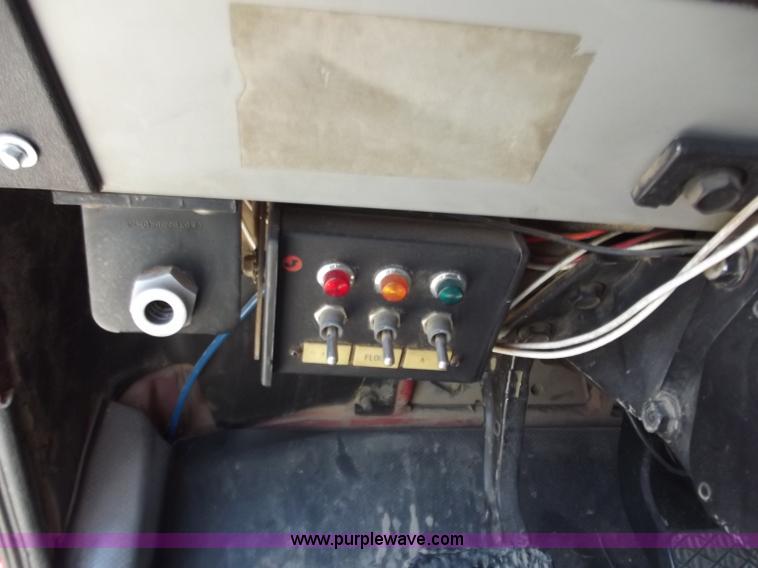 image for item C2014 1998 Freightliner FL60 business class roll back extended cab truck