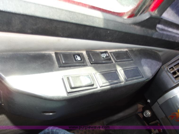 image for item C2014 1998 Freightliner FL60 business class roll back extended cab truck