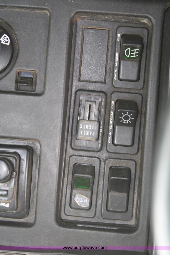 image for item B6597 2001 International 4900 semi truck cab and chassis