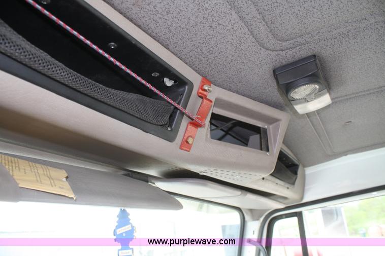 image for item B6597 2001 International 4900 semi truck cab and chassis