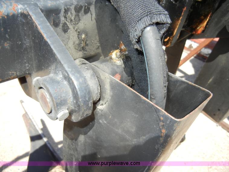 image for item K9204 Tree limb/brush grapple attachment for skid steer