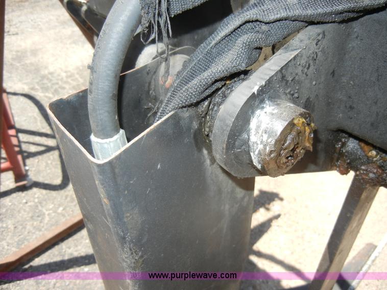 image for item K9204 Tree limb/brush grapple attachment for skid steer