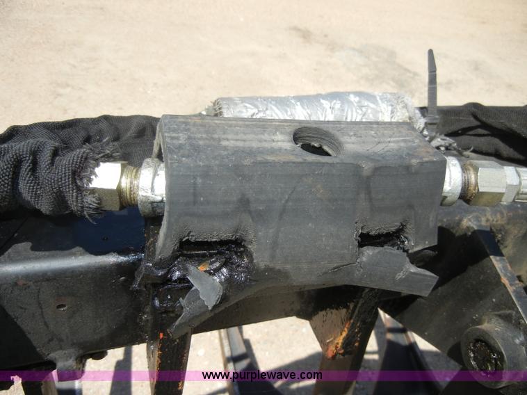 image for item K9204 Tree limb/brush grapple attachment for skid steer