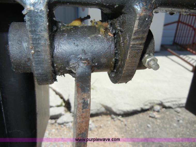 image for item K9204 Tree limb/brush grapple attachment for skid steer