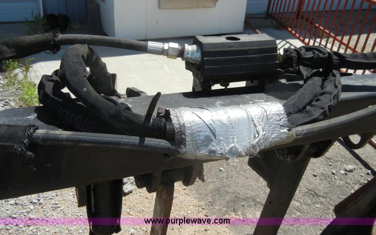 image for item K9204 Tree limb/brush grapple attachment for skid steer