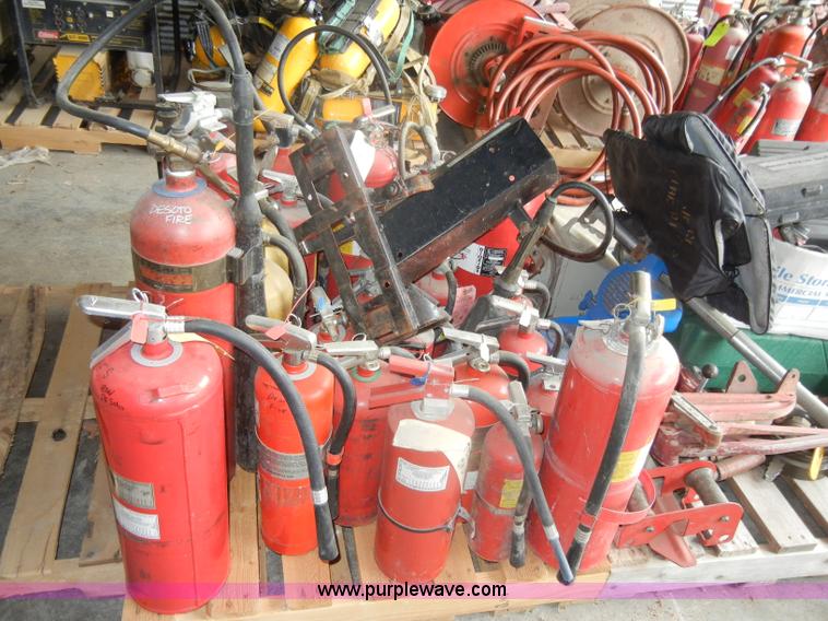 image for item M9509 Approximately 29 assorted fire extinguishers