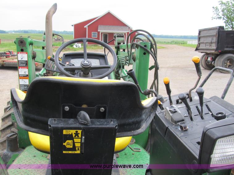image for item B2706 1998 John Deere 6410L MFWD tractor