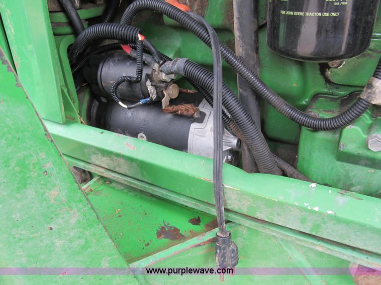 image for item B2706 1998 John Deere 6410L MFWD tractor