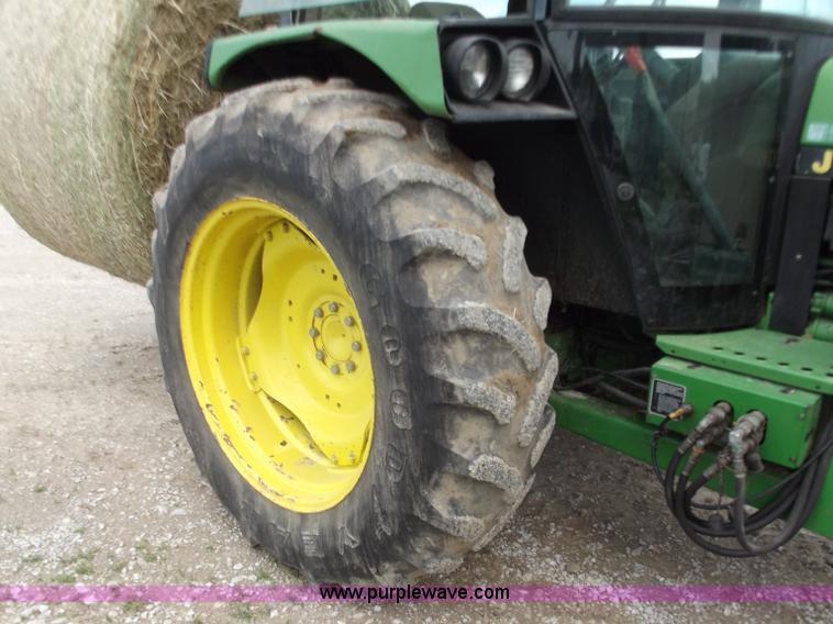 image for item C2096 1991 John Deere 2755 MFWD tractor with loader