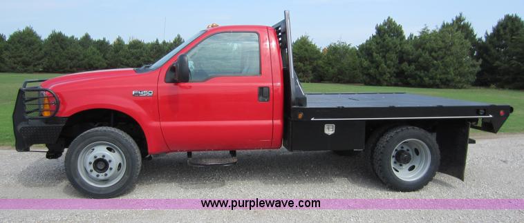 image for item C5496 2001 Ford F450 XL Super Duty flatbed pickup truck