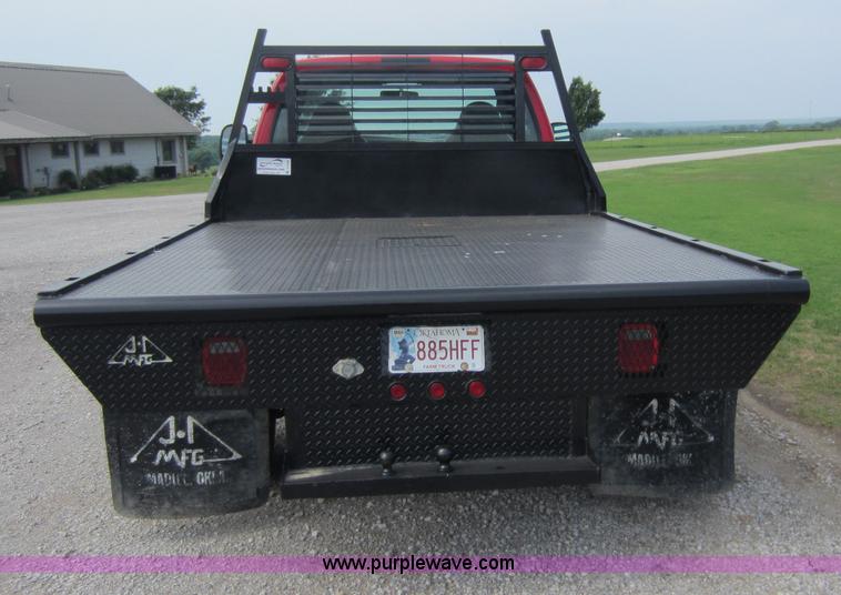 image for item C5496 2001 Ford F450 XL Super Duty flatbed pickup truck