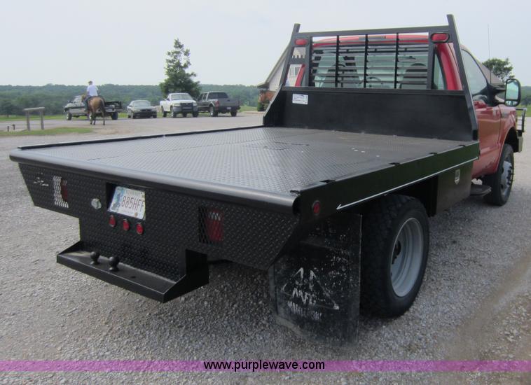 image for item C5496 2001 Ford F450 XL Super Duty flatbed pickup truck