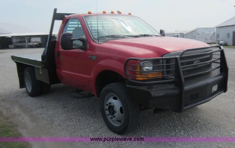 image for item C5496 2001 Ford F450 XL Super Duty flatbed pickup truck