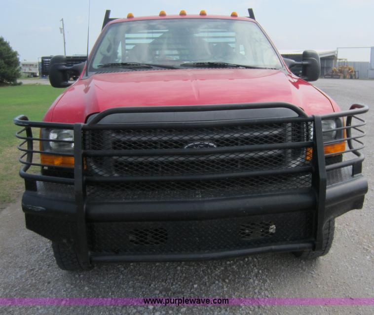 image for item C5496 2001 Ford F450 XL Super Duty flatbed pickup truck