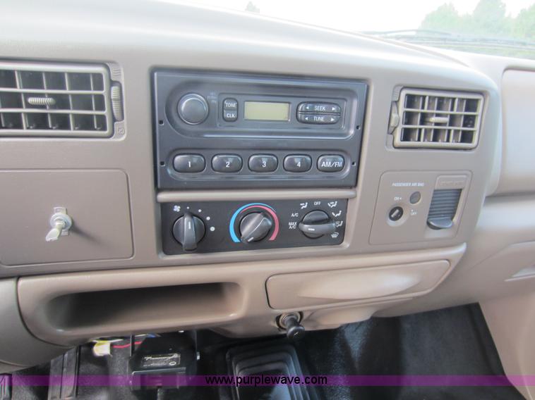 image for item C5496 2001 Ford F450 XL Super Duty flatbed pickup truck