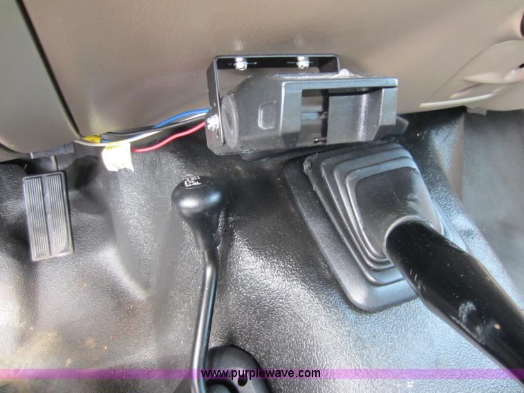 image for item C5496 2001 Ford F450 XL Super Duty flatbed pickup truck