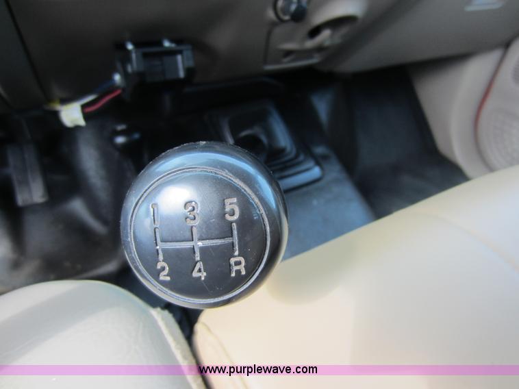 image for item C5496 2001 Ford F450 XL Super Duty flatbed pickup truck