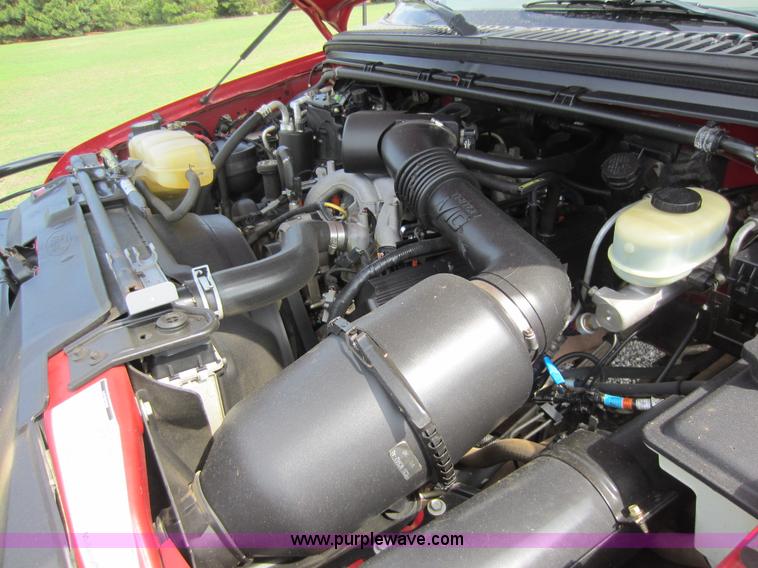 image for item C5496 2001 Ford F450 XL Super Duty flatbed pickup truck