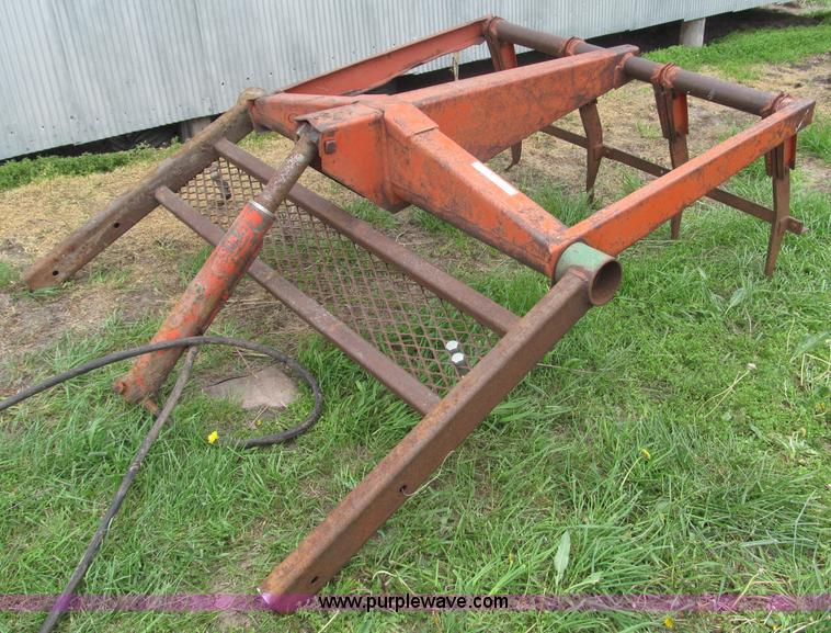image for item G9486 1973 Dual 320 bucket mount grapple forks