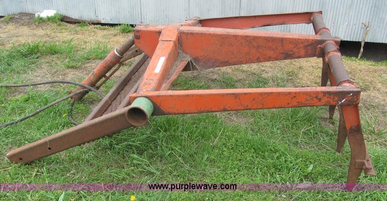 image for item G9486 1973 Dual 320 bucket mount grapple forks