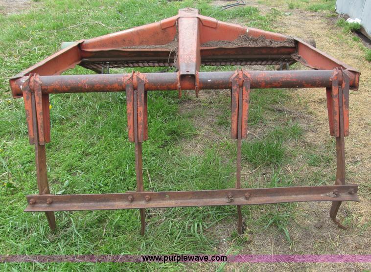 image for item G9486 1973 Dual 320 bucket mount grapple forks