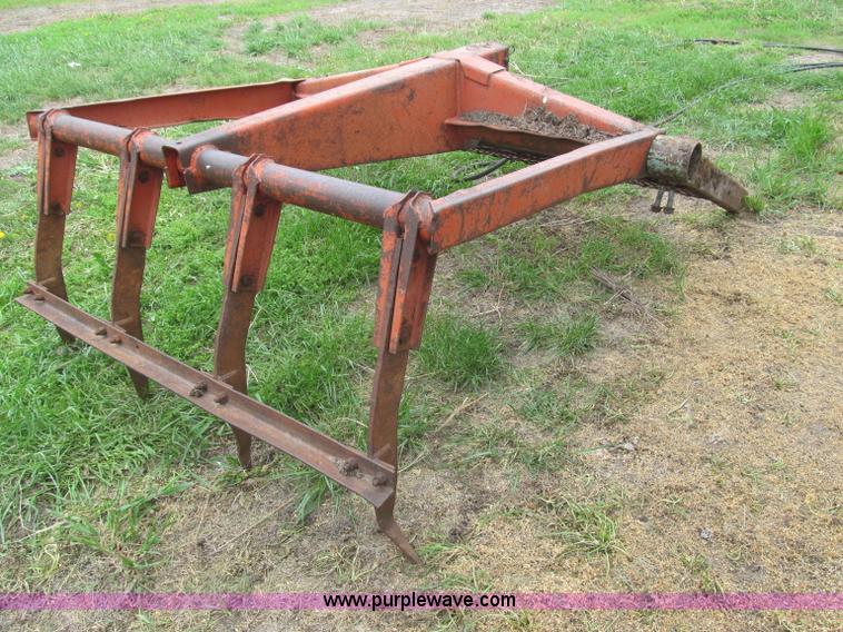 image for item G9486 1973 Dual 320 bucket mount grapple forks