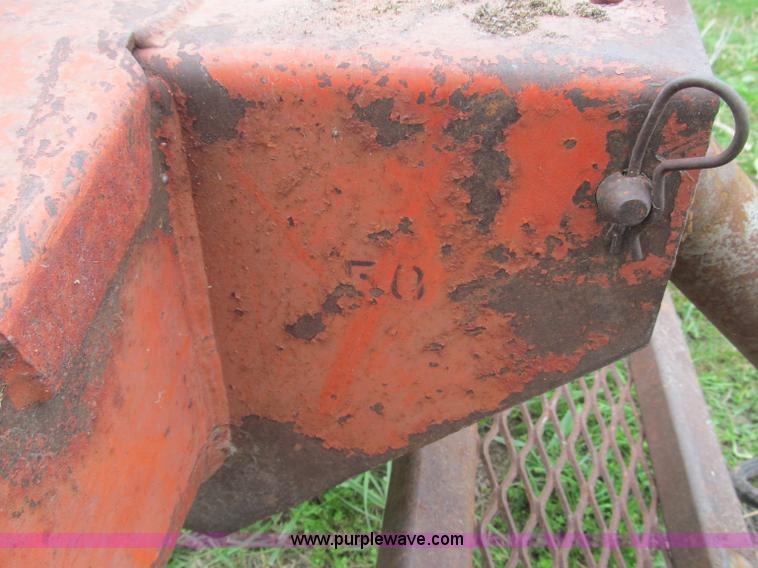 image for item G9486 1973 Dual 320 bucket mount grapple forks