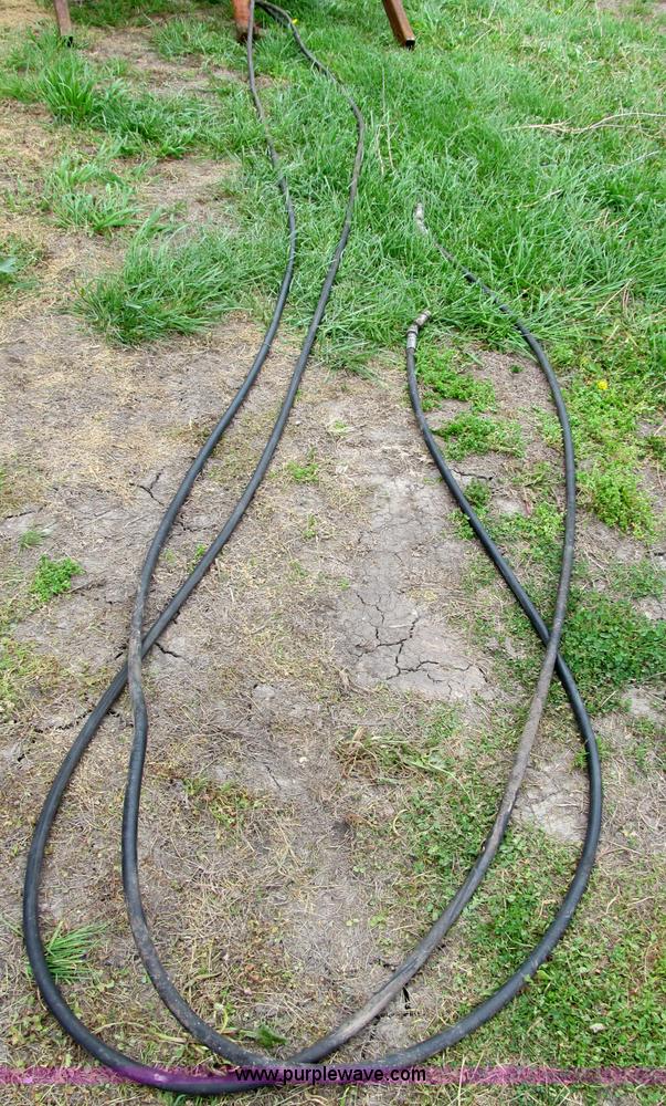 image for item G9486 1973 Dual 320 bucket mount grapple forks