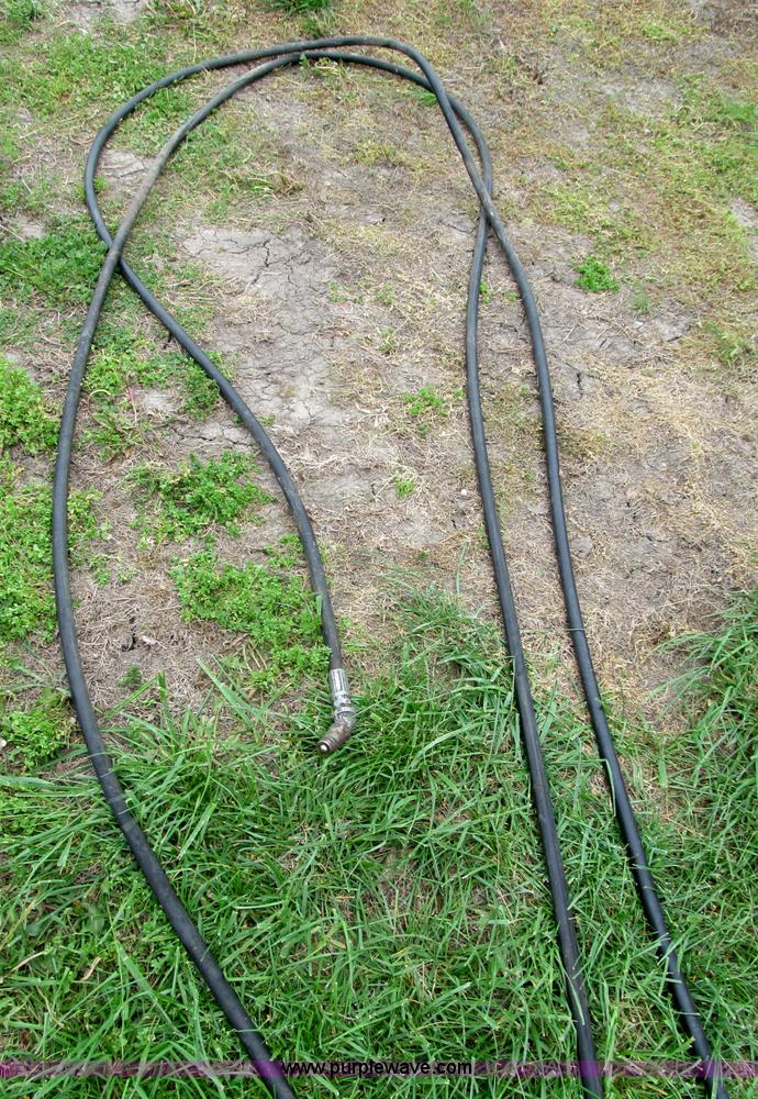 image for item G9486 1973 Dual 320 bucket mount grapple forks