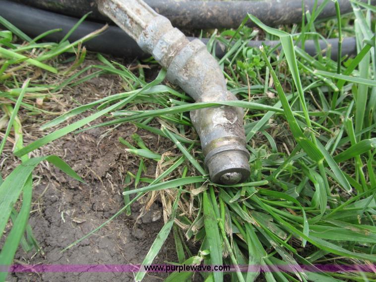 image for item G9486 1973 Dual 320 bucket mount grapple forks