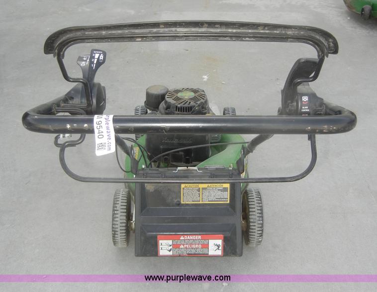 image for item M9540 John Deere WE85 push mower with bagger