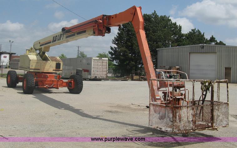 image for item A6338 1998 JLG 120HX telescoping boom lift