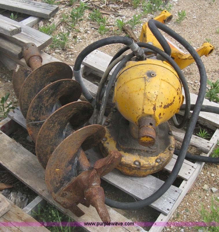 Hydraulic auger attachment for backhoe in Wichita, KS Item A6351 sold