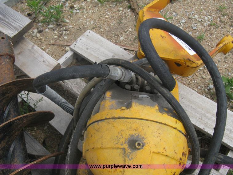 Hydraulic auger attachment for backhoe in Wichita, KS Item A6351 sold