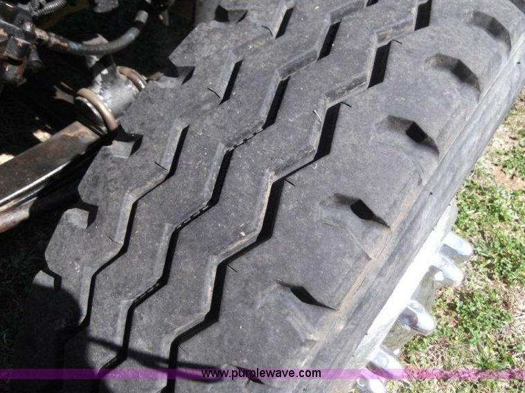 image for item B1276 1996 Freightliner Classic tandem axle dump truck