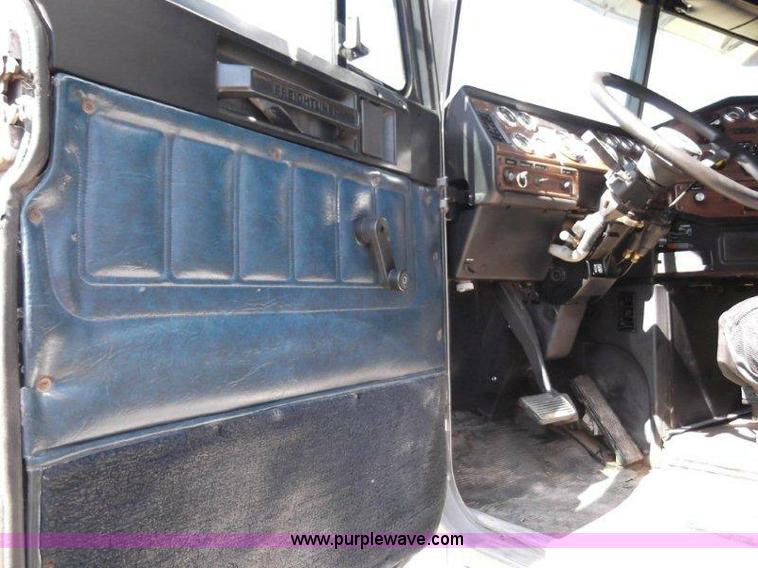 image for item B1276 1996 Freightliner Classic tandem axle dump truck