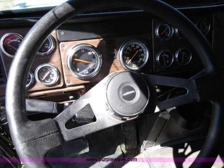 image for item B1276 1996 Freightliner Classic tandem axle dump truck