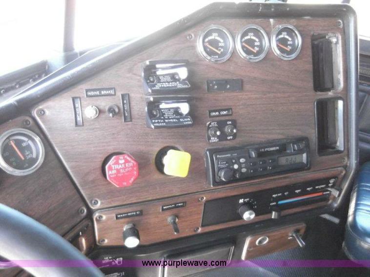 image for item B1276 1996 Freightliner Classic tandem axle dump truck