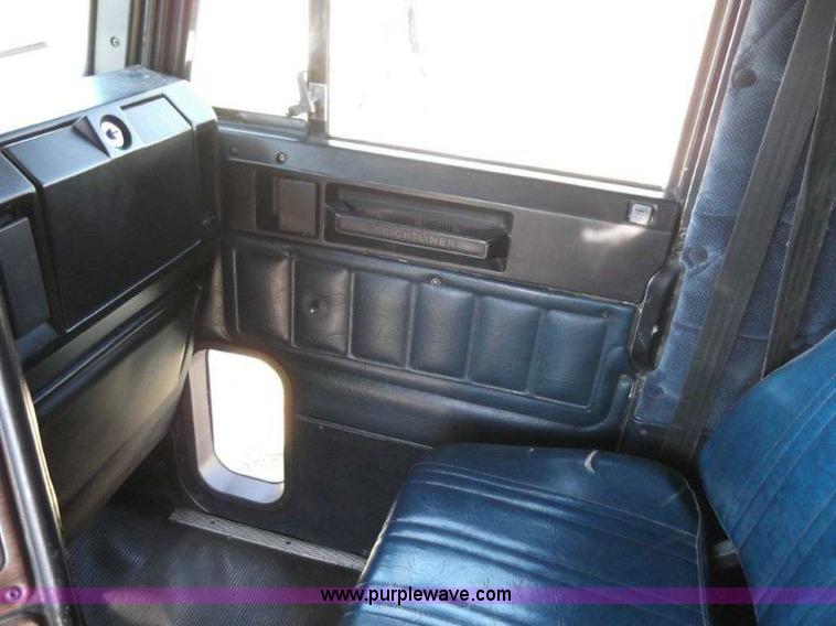 image for item B1276 1996 Freightliner Classic tandem axle dump truck