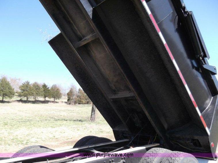 image for item B1276 1996 Freightliner Classic tandem axle dump truck