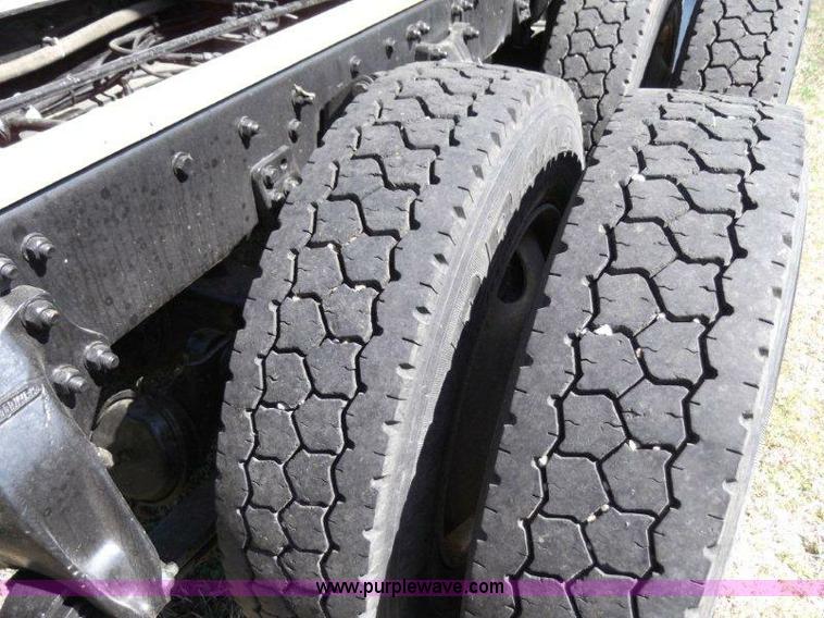 image for item B1276 1996 Freightliner Classic tandem axle dump truck