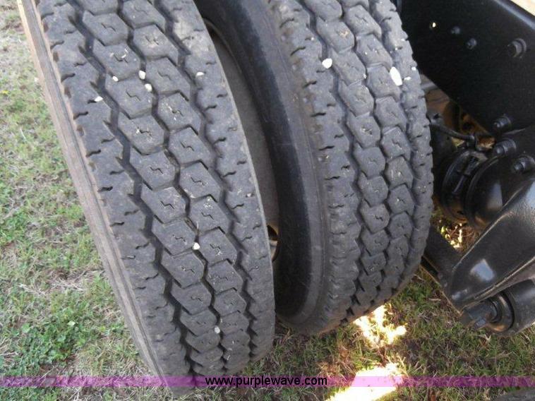 image for item B1276 1996 Freightliner Classic tandem axle dump truck