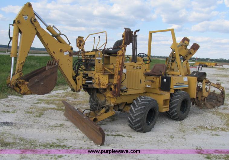 image for item B2702 1999 Vermeer V4750 trencher/backhoe combo with cable plow