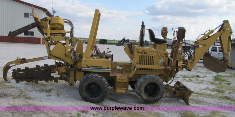 image for item B2702 1999 Vermeer V4750 trencher/backhoe combo with cable plow