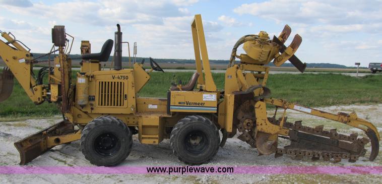 image for item B2702 1999 Vermeer V4750 trencher/backhoe combo with cable plow