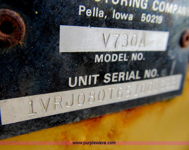 image for item B2702 1999 Vermeer V4750 trencher/backhoe combo with cable plow