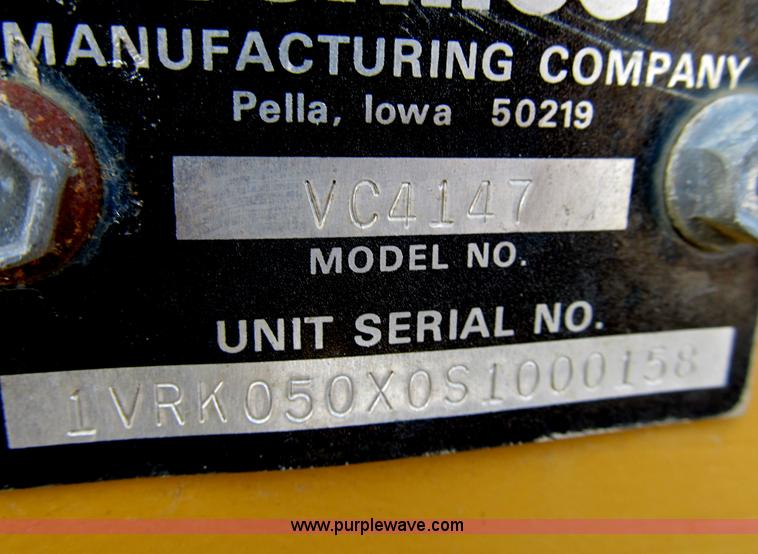 image for item B2702 1999 Vermeer V4750 trencher/backhoe combo with cable plow