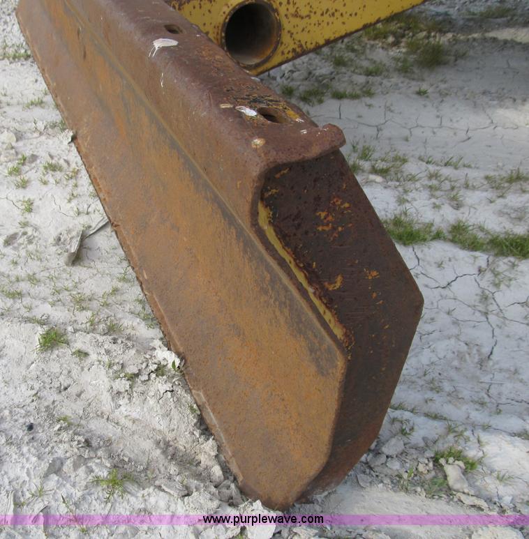 image for item B2702 1999 Vermeer V4750 trencher/backhoe combo with cable plow